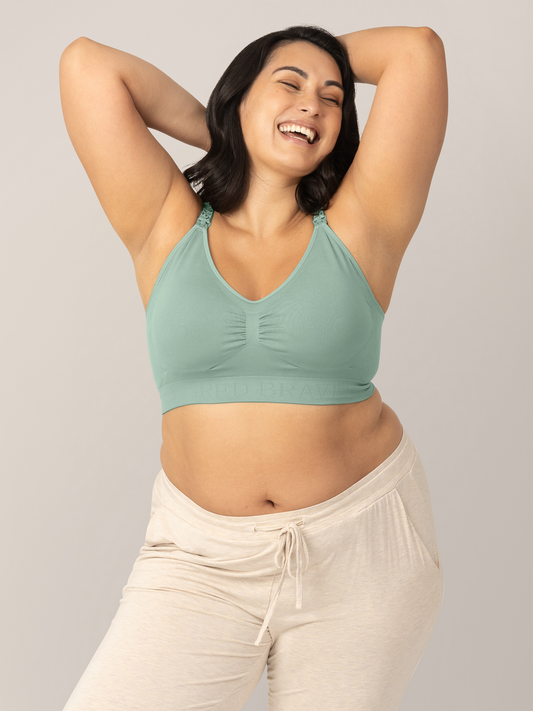 Front view of model wearing the Simply Sublime® Nursing Bra in Cactus in a busty fit, with arms bent and hands behind head @model_info:Connie is wearing an X-Large Busty.