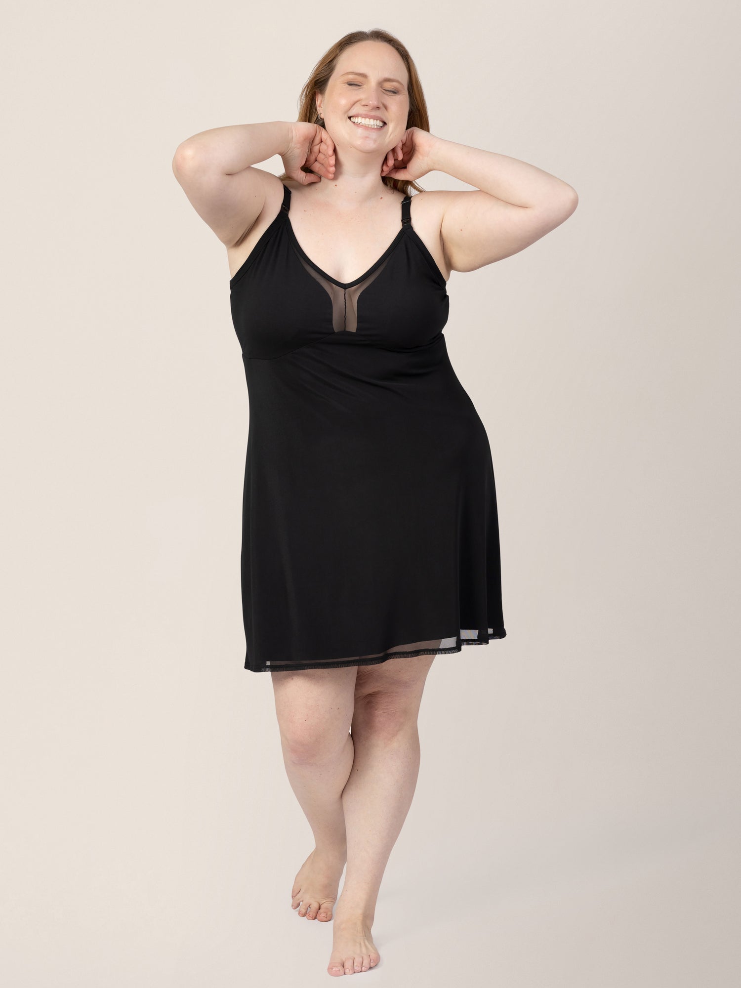 Front view of model wearing the Aurora Mesh Nursing Nightgown in black. @model_info:Ryn is 5'9" and wearing an X-Large.