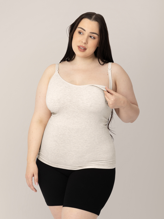 Model showing the easy clip down nursing access on the Sublime® Bamboo Maternity & Nursing Camisole in Oatmeal Heather. @model_info:Rachel is wearing a Large.