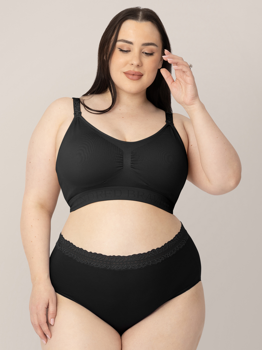Model wearing the Simply Sublime® Nursing Bra in Black  with her hand in her hair. @model_info:Rachel is wearing an X-Large Busty. 