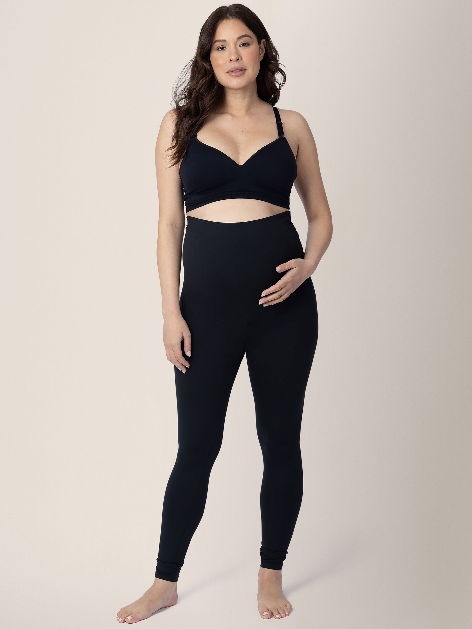 Model wearing the Louisa Maternity & Postpartum Legging in Black classic. @model_info:Vanessa is 5'8" and wearing a Small.