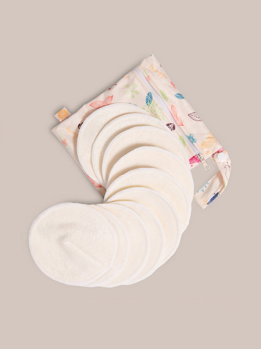 Flat lay of the Organic Bamboo Reusable Nursing Pads against an off white background. 