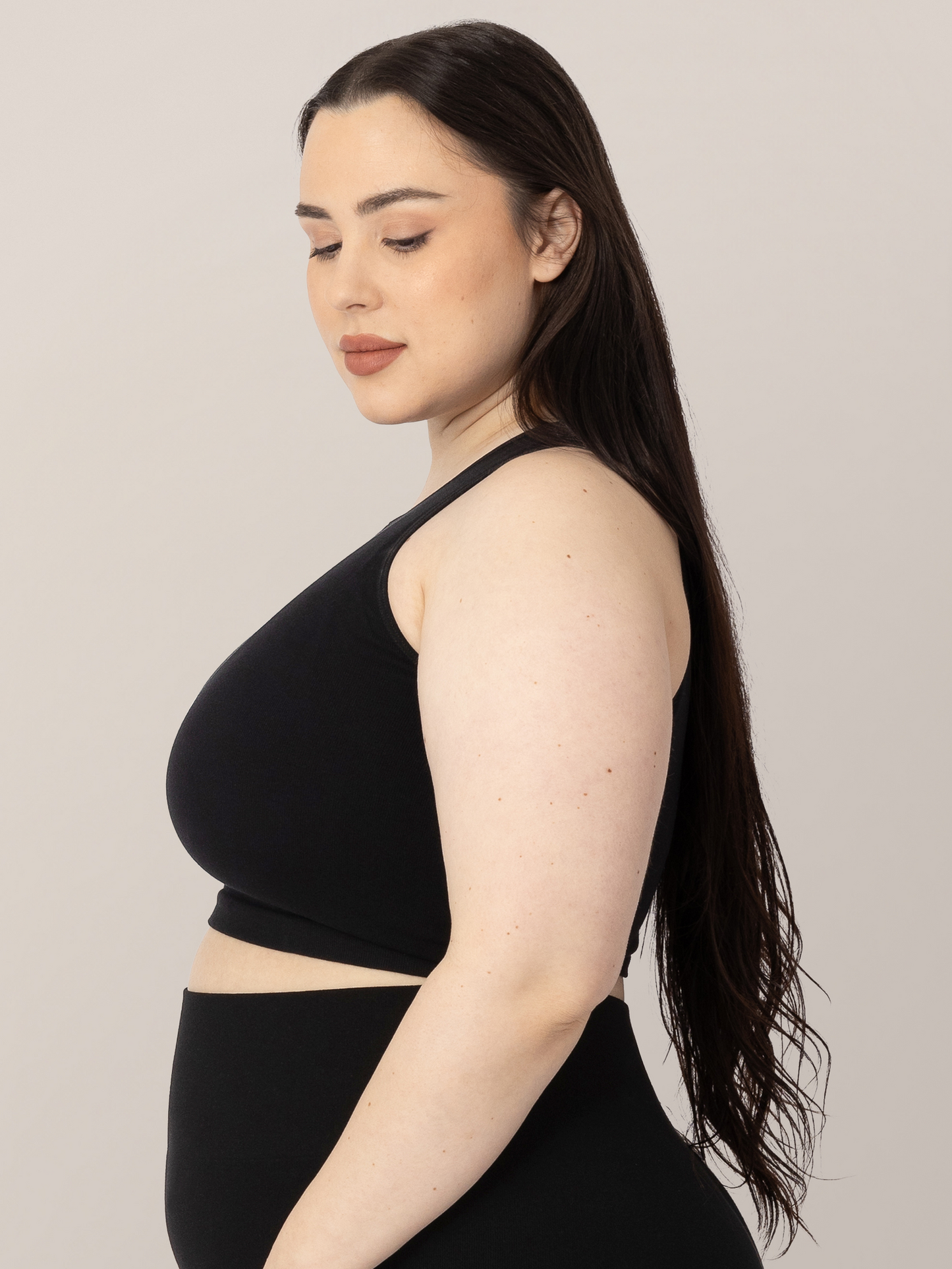 Side view of Model wearing the Sublime Bamboo Maternity & Nursing Longline Bra in Black