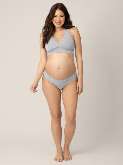 Front view of a pregnant model wearing the Bamboo Maternity & Postpartum Thong in Grey Heather 