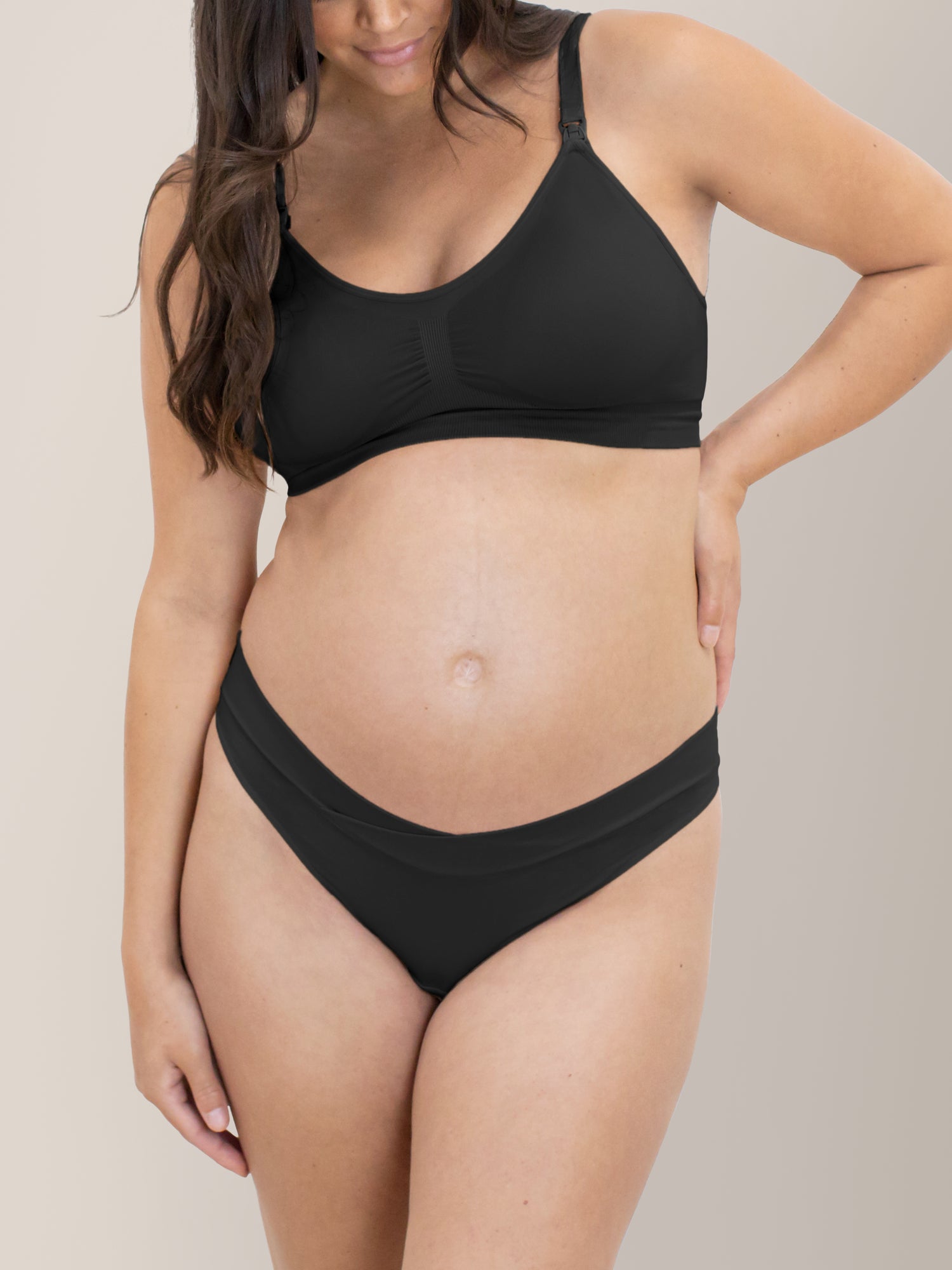 Front view of a model wearing the Bamboo Maternity & Postpartum Thong in Black