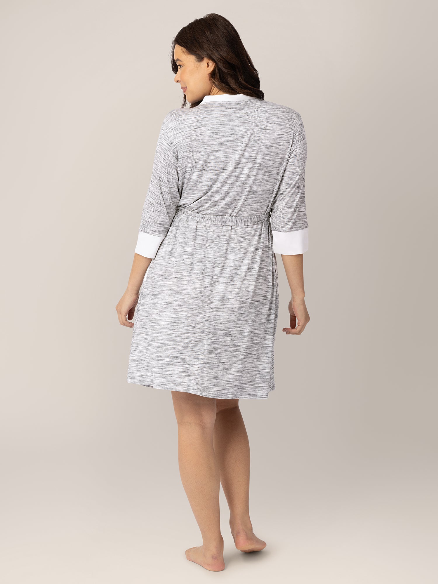Back view of a model wearing the Emmaline Robe in Grey