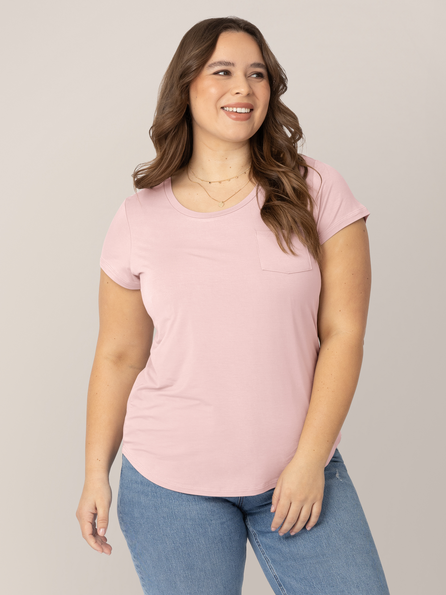Model wearing the  Everyday Maternity & Nursing T-shirt in Dusty Pink with a pocket.