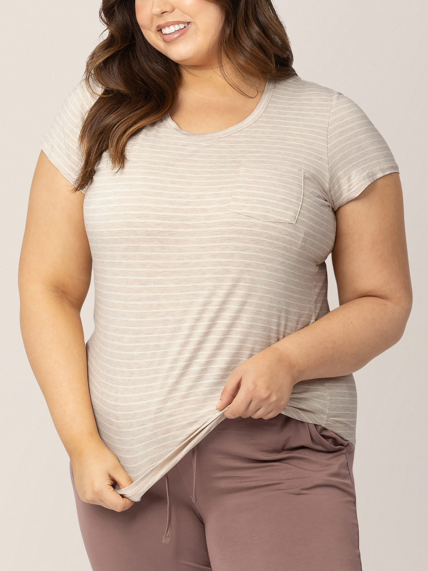 Closeup of a model wearing the Everyday Maternity & Nursing T-shirt in Oatmeal Stripe