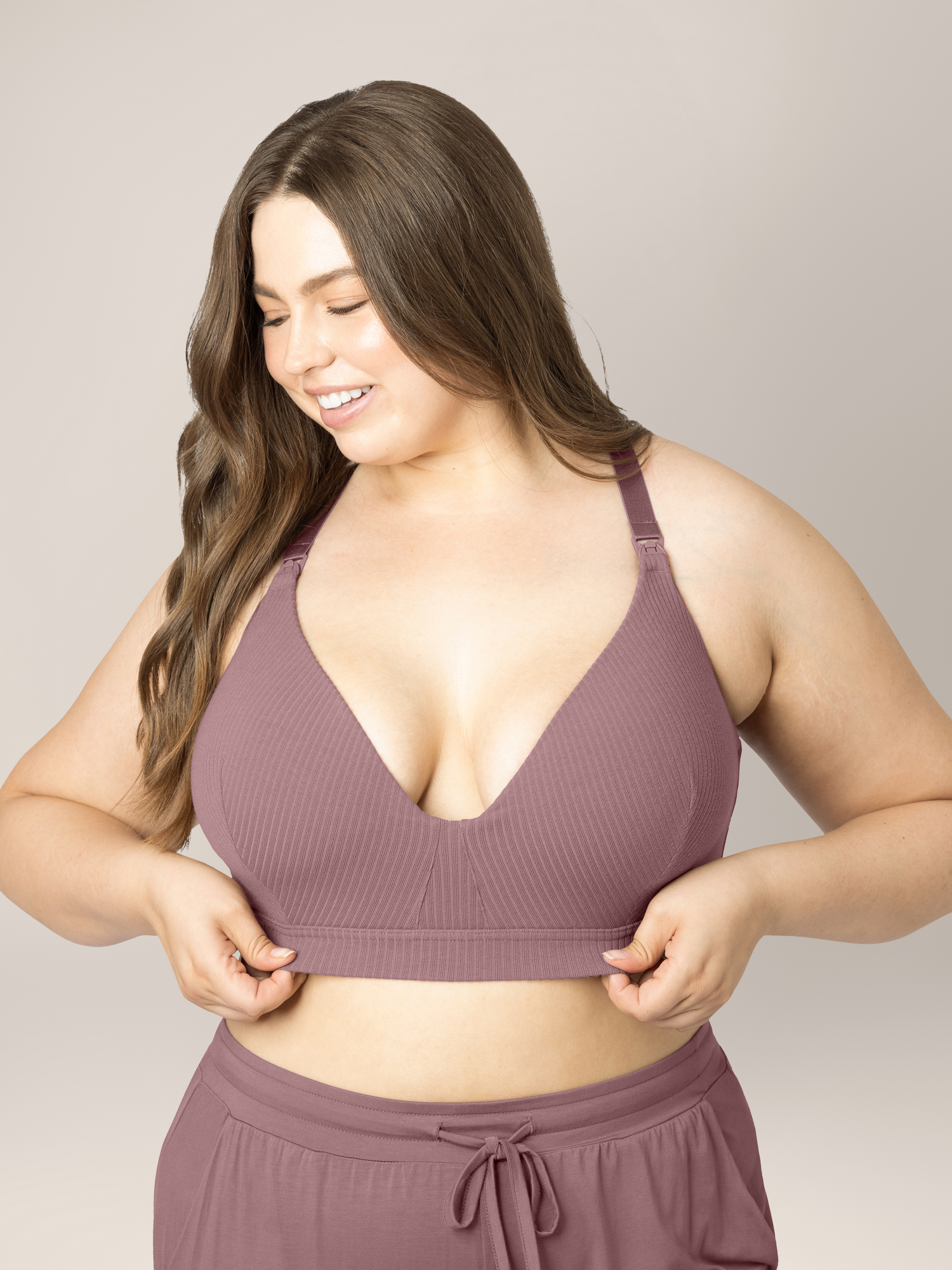Front view of a model wearing the Ribbed Cotton Maternity & Nursing Bra in Twilight. @model_info:Bailey is wearing an X-Large Busty.