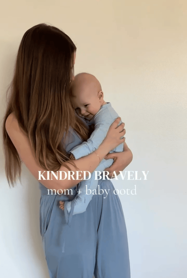 Rotating gif of mom spinning baby while wearing Sublime® Bamboo Maternity & Nursing Longline Bra Top in Vintage Blue and Ultralight Sleep & Lounge Jogger and Vintage Blue. White text: KINDRED BRAVELY, mom + baby ootd