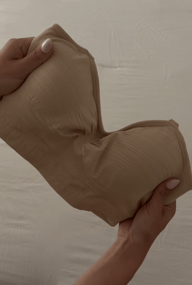 Rotating gif of pregnant woman preparing Sublime® Hands-Free Pumping & Nursing Bra for pumping, displaying it's flexibility and support.