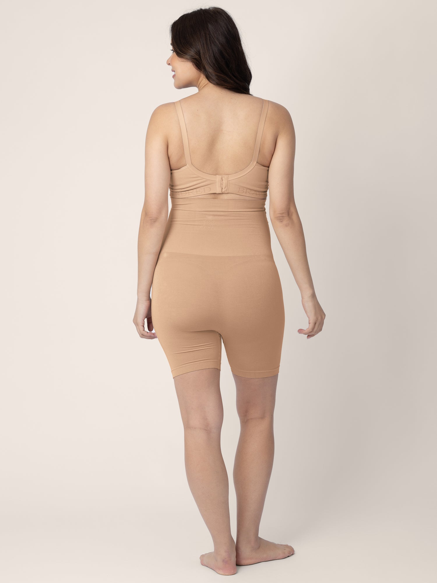 Back of a model wearing the Seamless Bamboo Maternity Thigh Savers