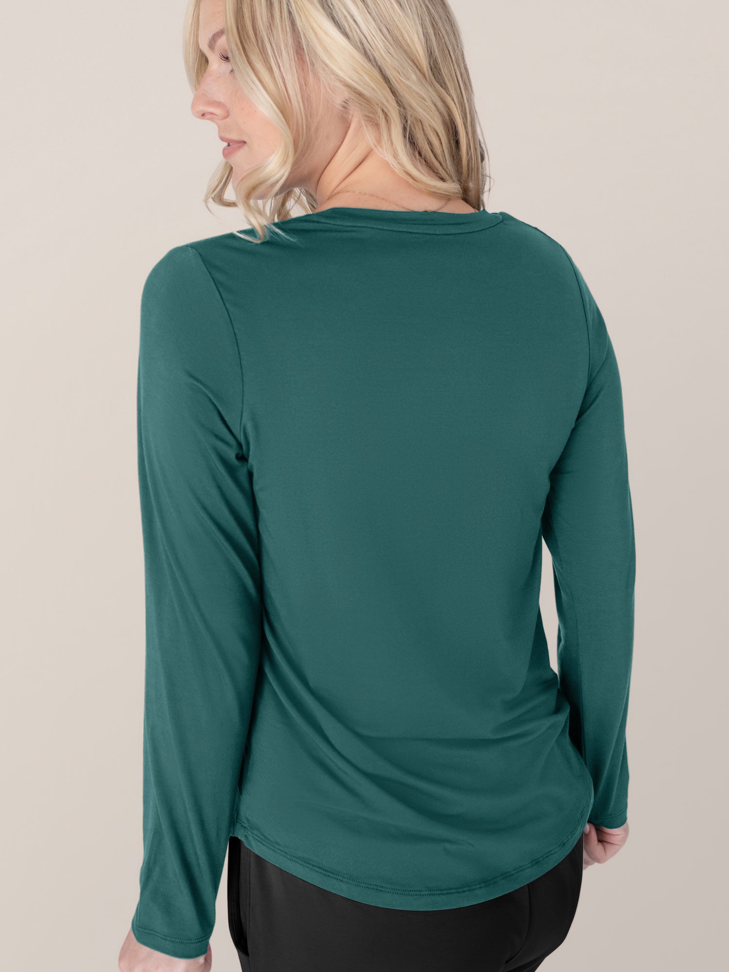 Back view of a model wearing the Bamboo Maternity & Nursing Long Sleeve T-shirt in Evergreen