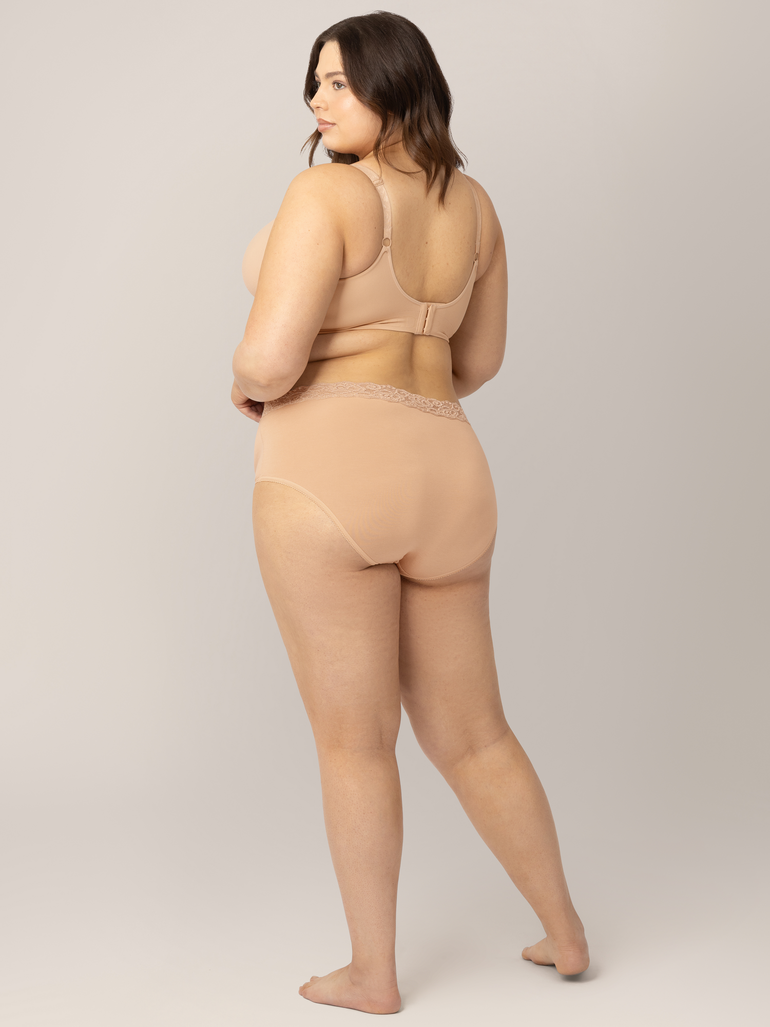 Back view of a model wearing the High-Waisted Postpartum Underwear in Assorted Neutrals