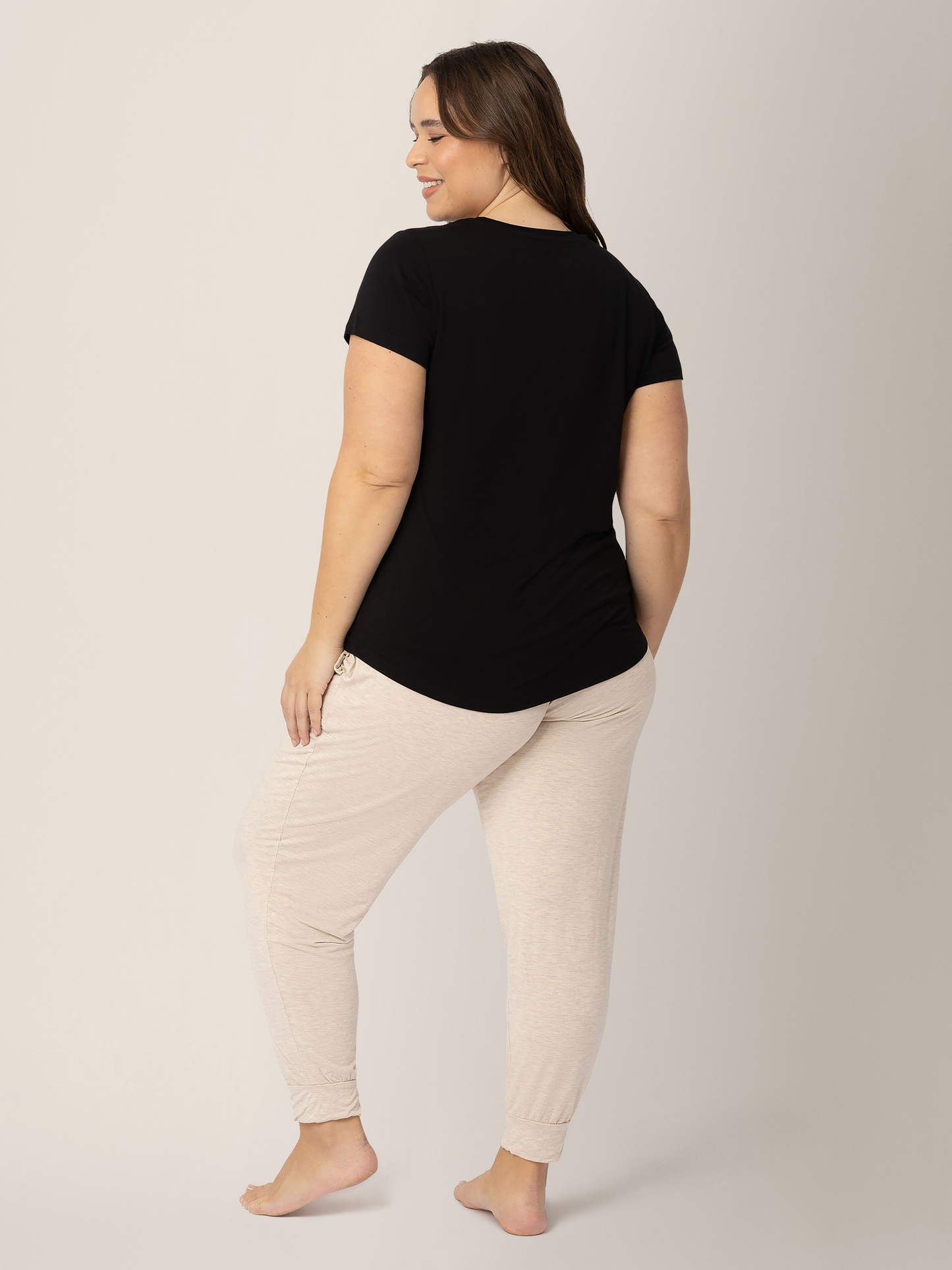 Back of a model wearing the Everyday Maternity & Nursing T-shirt in Black 