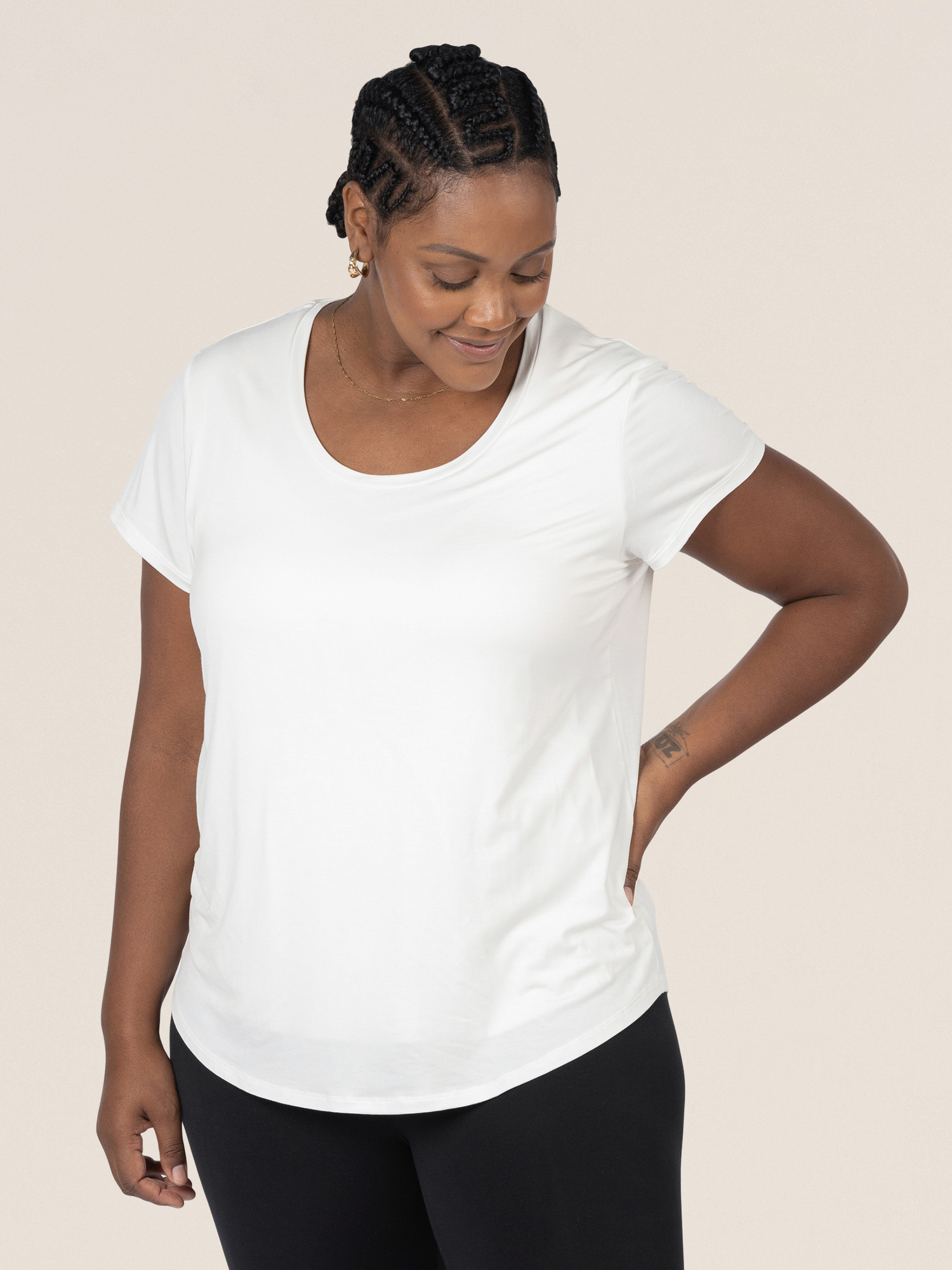 Model wearing the Everyday Maternity & Nursing T-shirt in White  with her hand on her hip. 