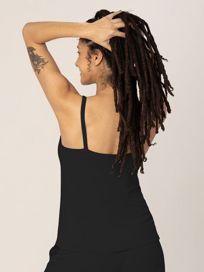 Back of a model wearing the  Bamboo Lounge Around Nursing Tank in Black