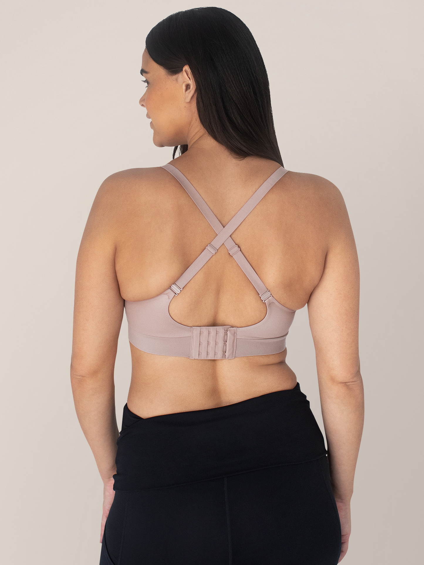 Back view of a model wearing the Minimalist Hands-Free Pumping & Nursing Bra in Lilac Stone