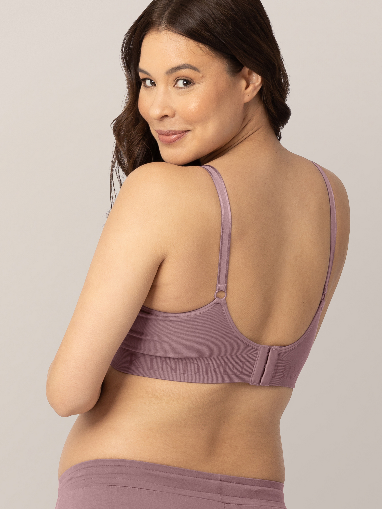 Back of a pregnant model wearing the Simply Sublime® Nursing Bra in Twilight