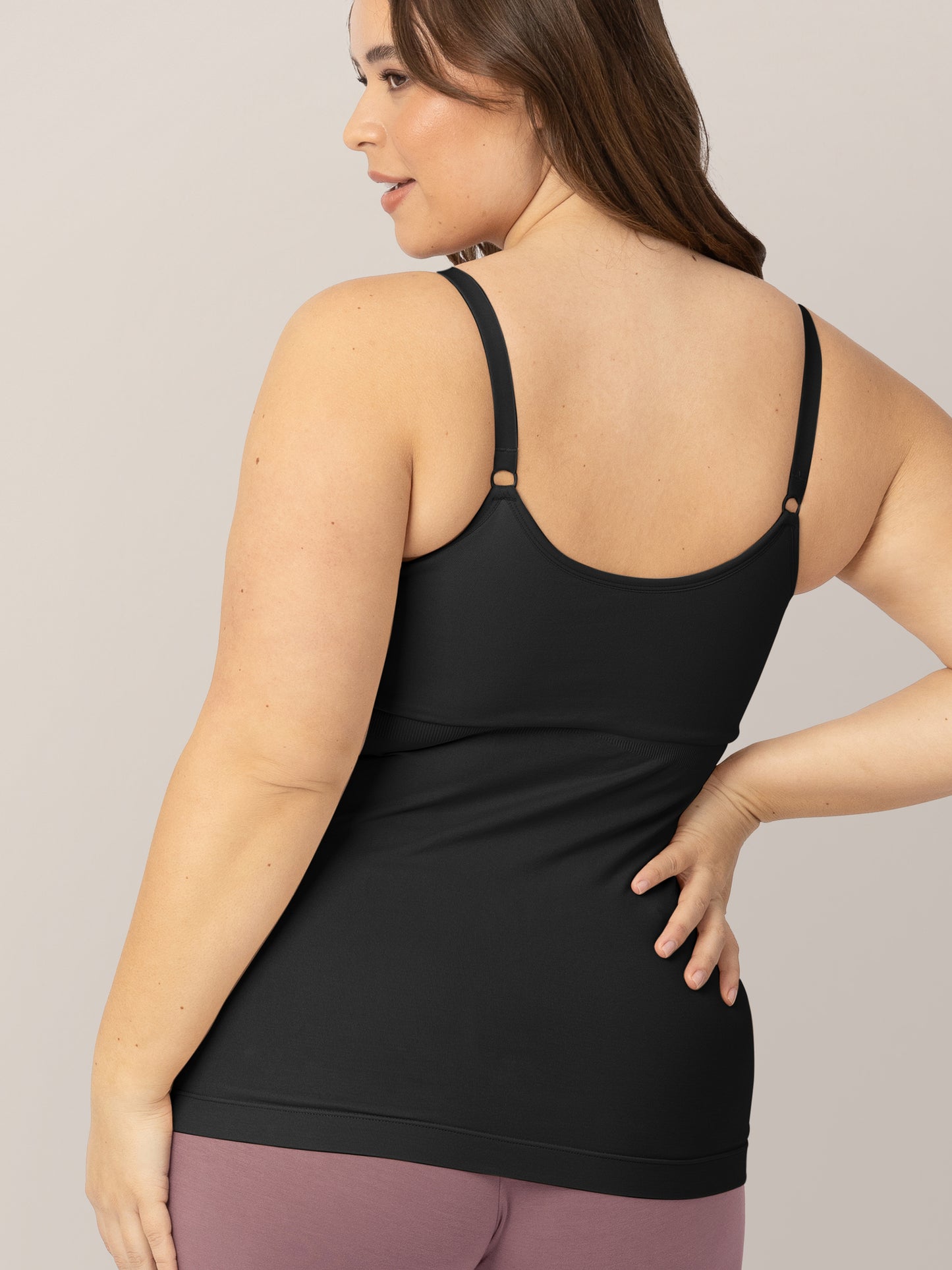 Back of a model wearing the Sublime® Hands-Free Pumping & Nursing Tank in Black