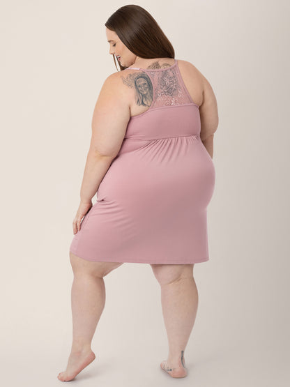 Back view of a model wearing the Lucille Maternity & Nursing Nightgown in Vintage Pink. 