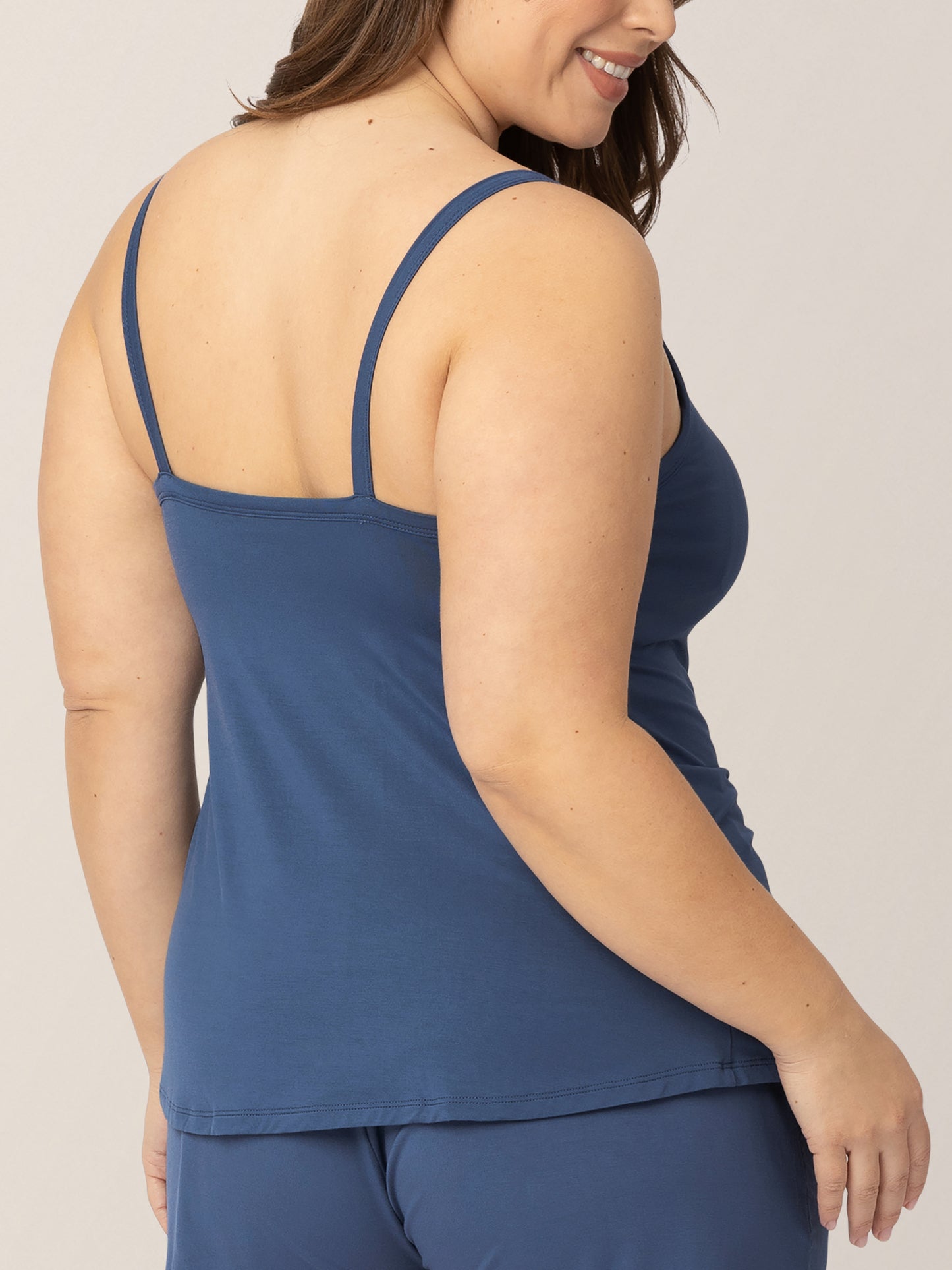 Back view of a model wearing the Bamboo Lounge Around Nursing Tank in Slate Blue.