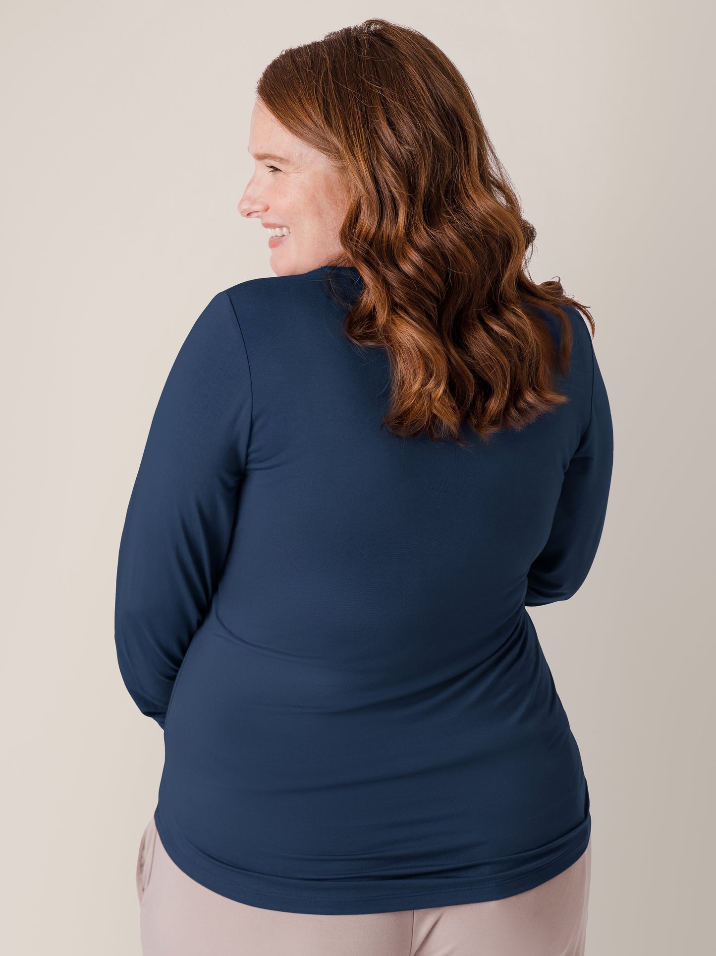 Back of a pregnant model wearing the Bamboo Maternity & Nursing Long Sleeve T-shirt in Navy 