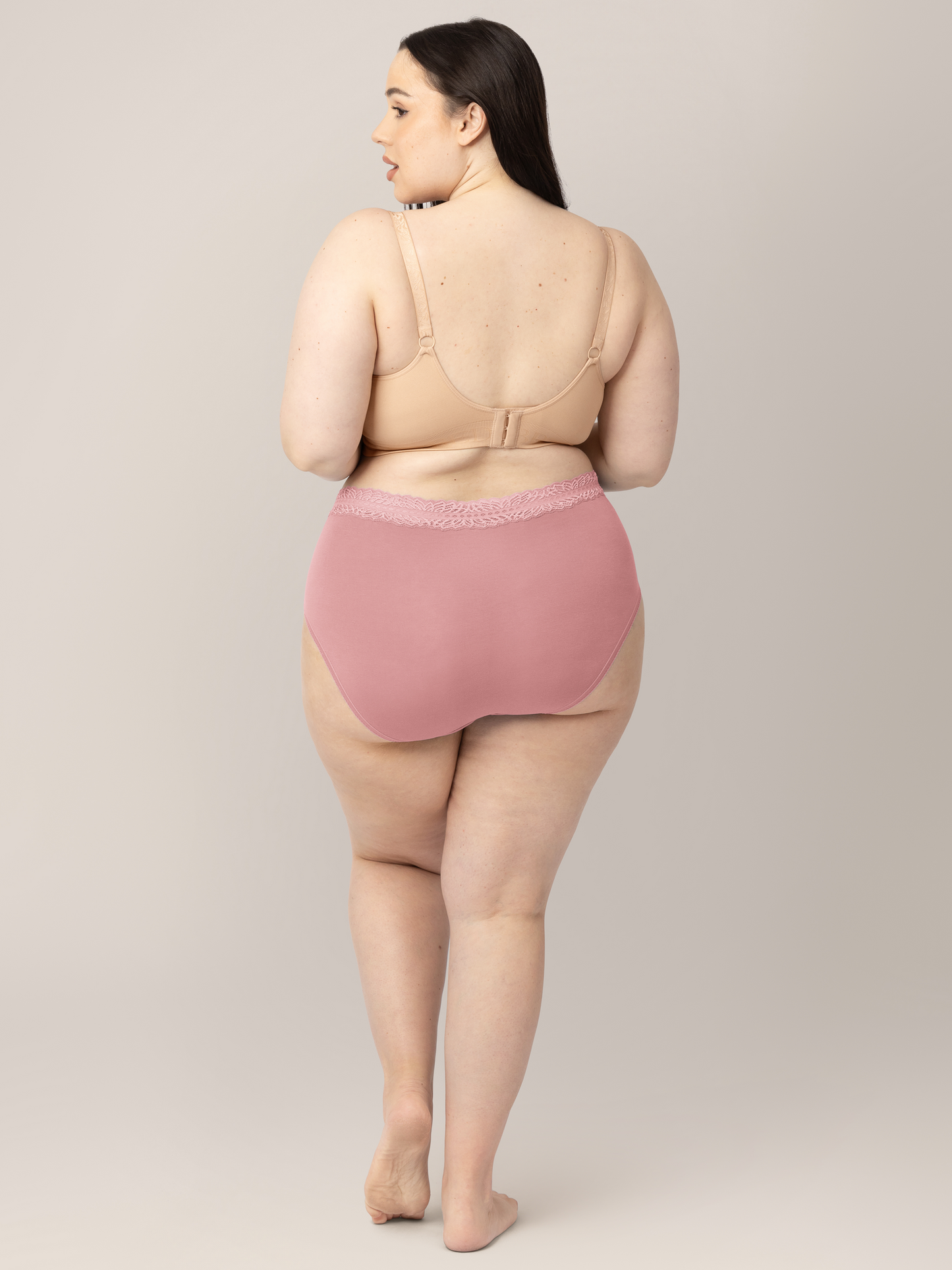 Back view of a model wearing the High Waisted Postpartum underwear in Dusty Hues. 