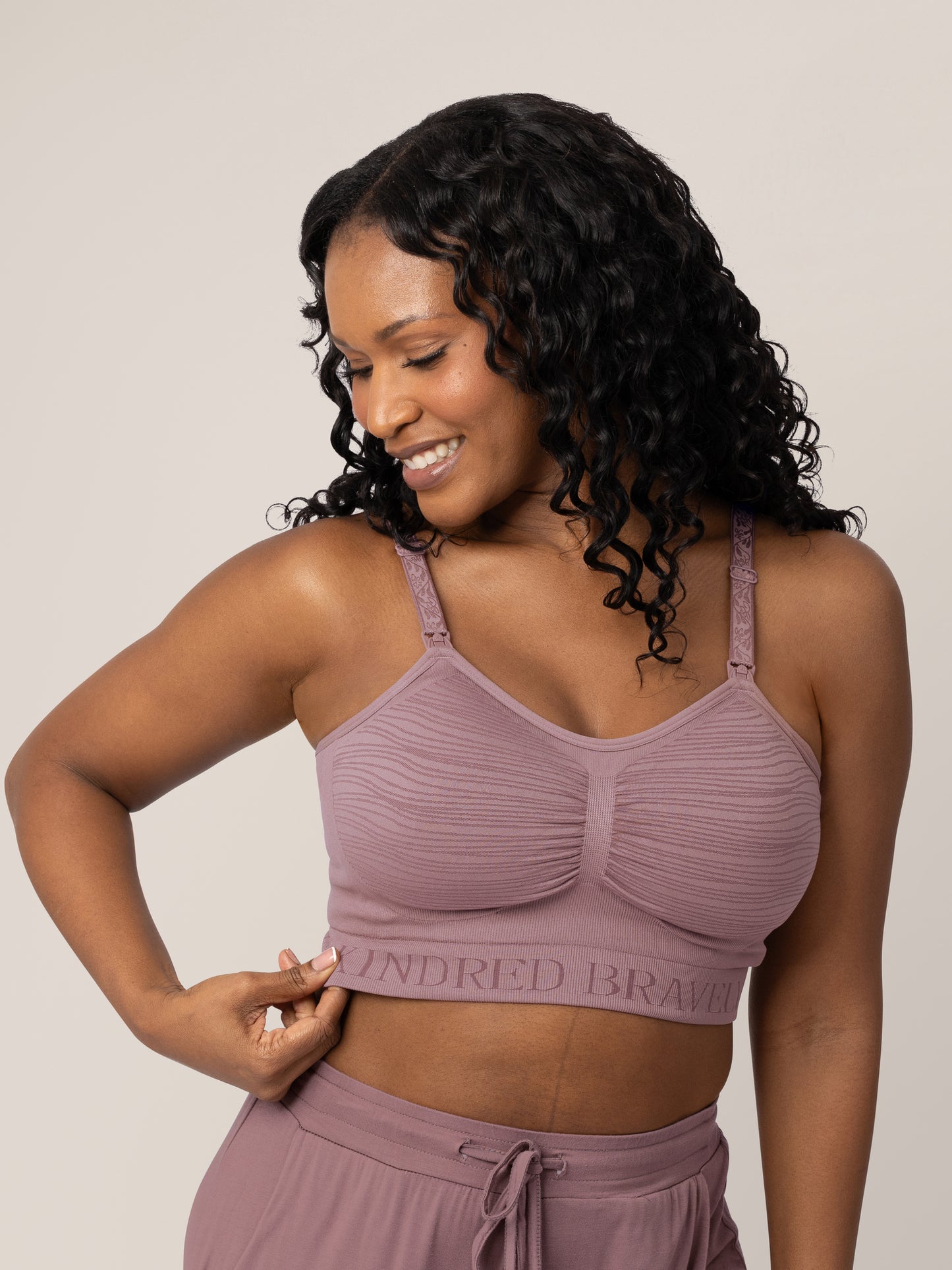 Closeup of a model wearing the Sublime® Hands-Free Pumping & Nursing Bra in Twilight