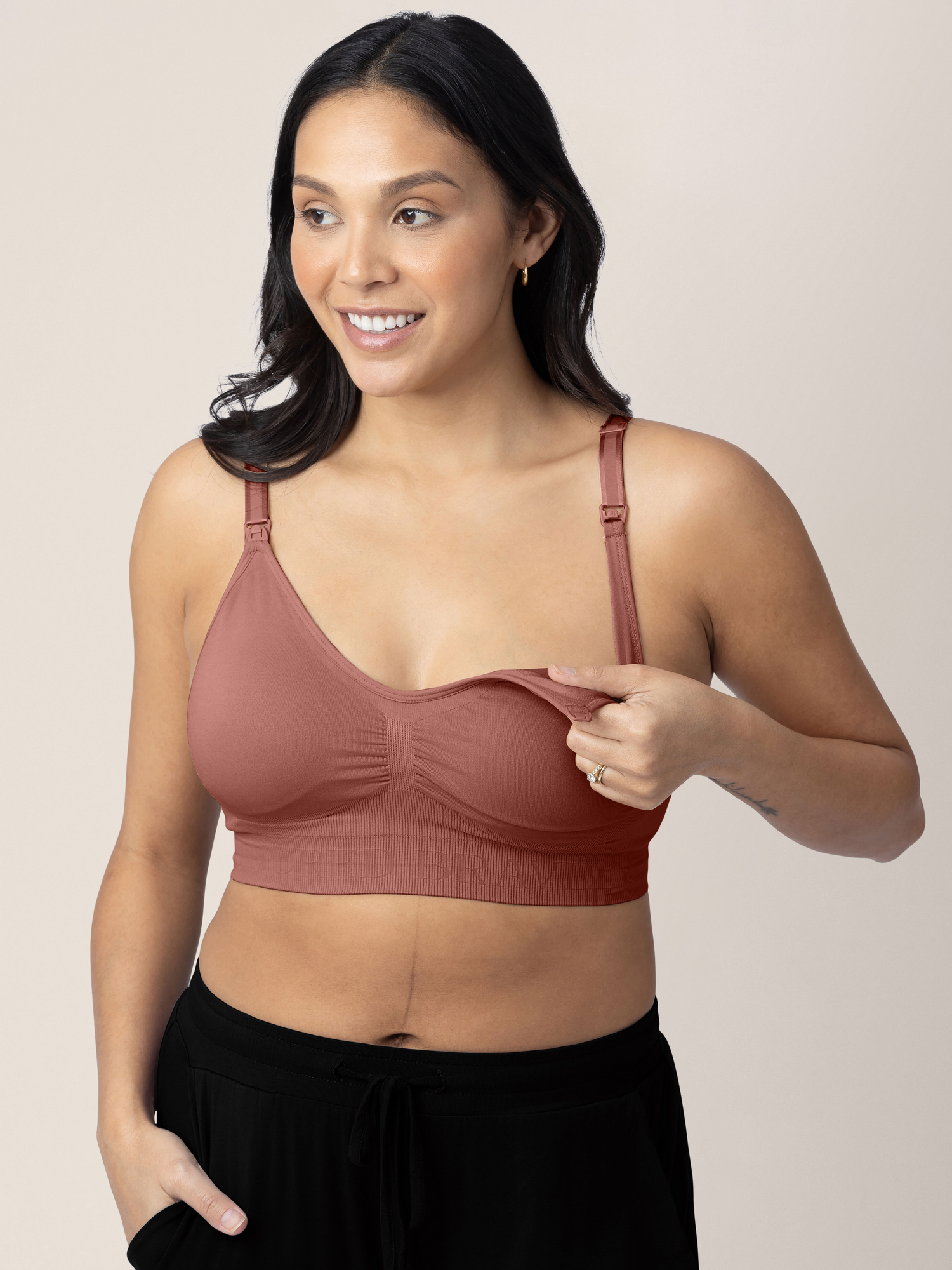 Model showing the clip down nursing access on the Simply Sublime® Nursing Bra in Redwood