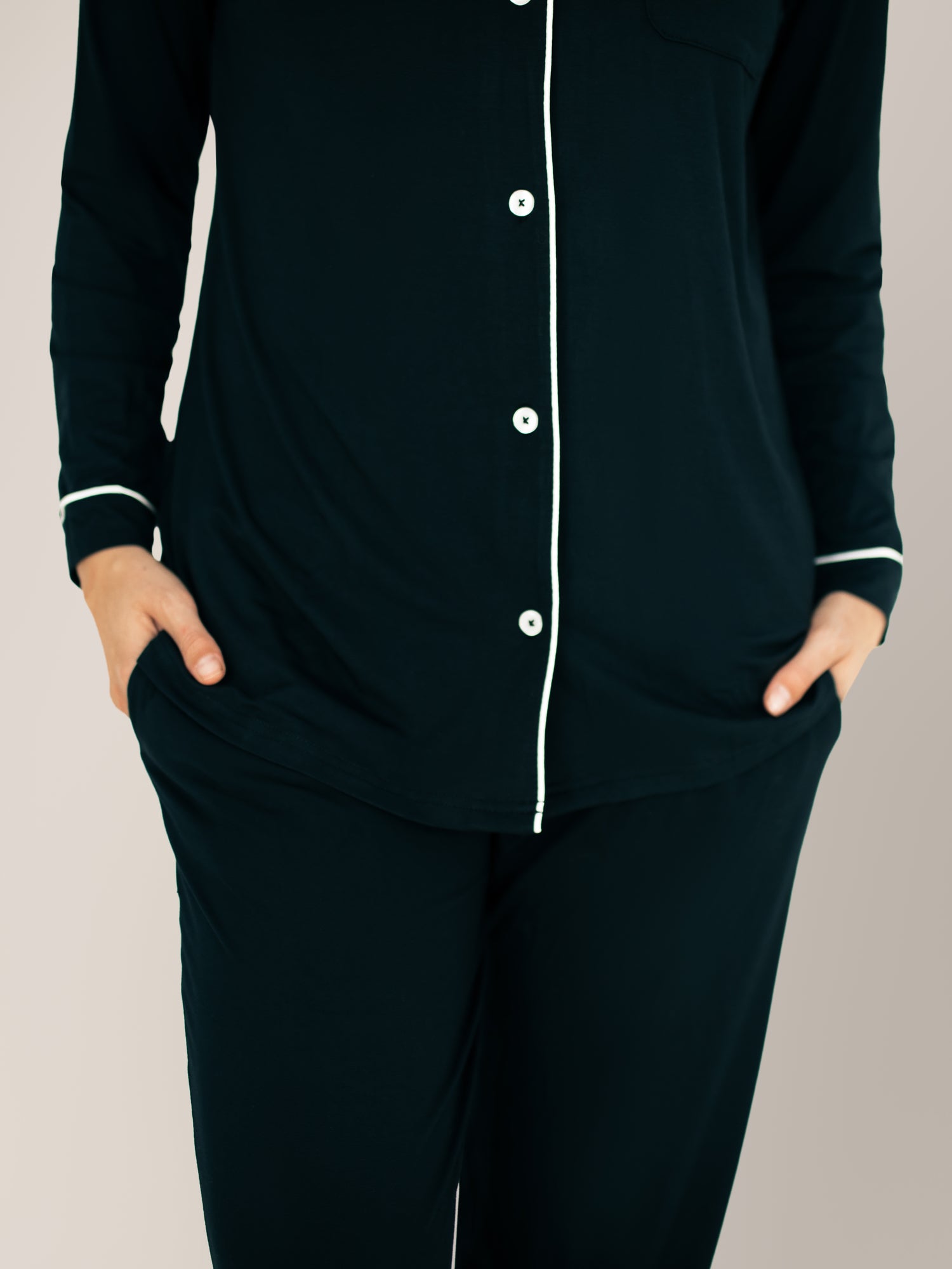 Closeup of the waistband of the Clea Bamboo Long Sleeve Pajama Set in Black