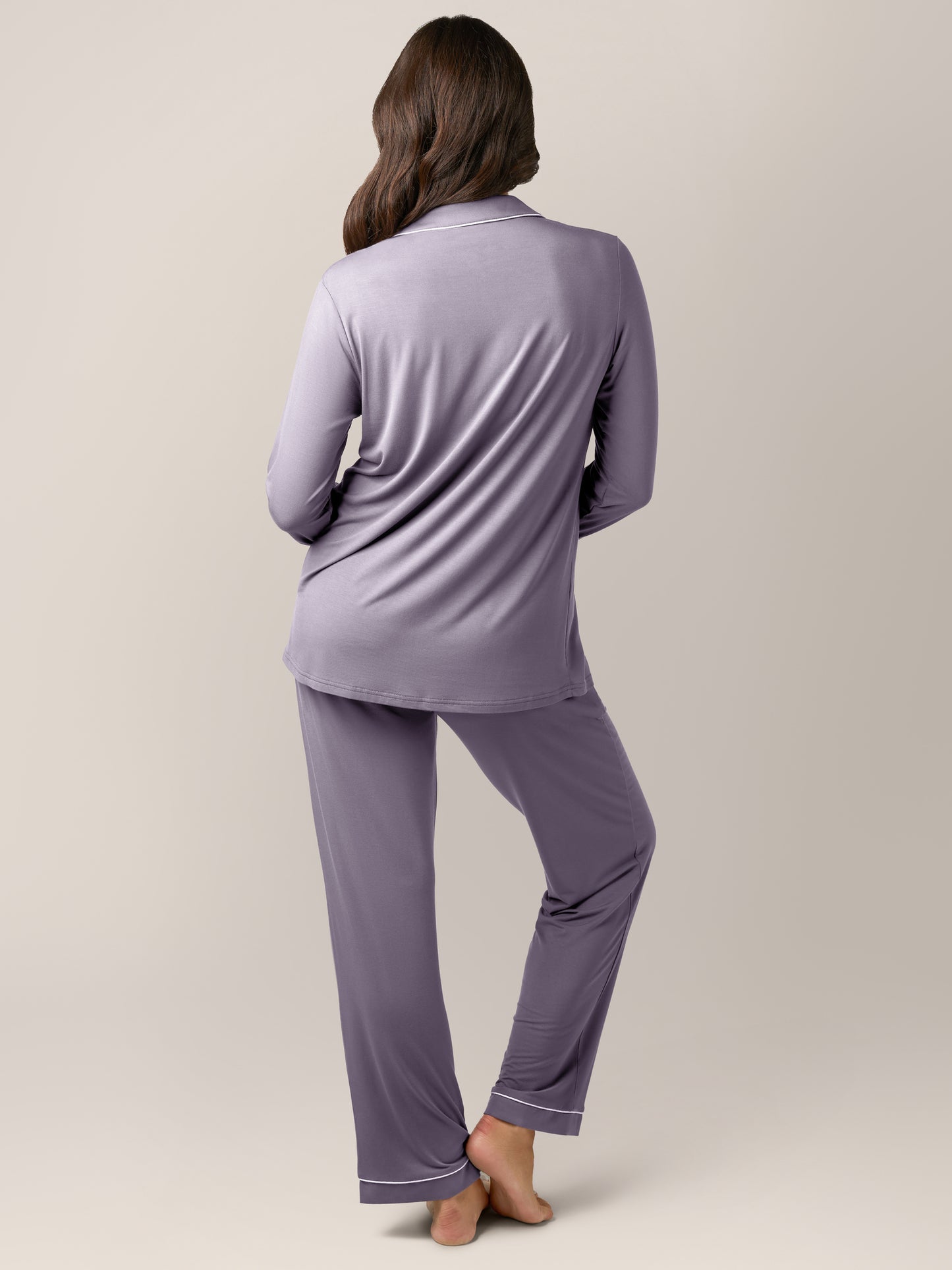 Back view of a model wearing the Clea Bamboo Long Sleeve Pajama Set in Granite.