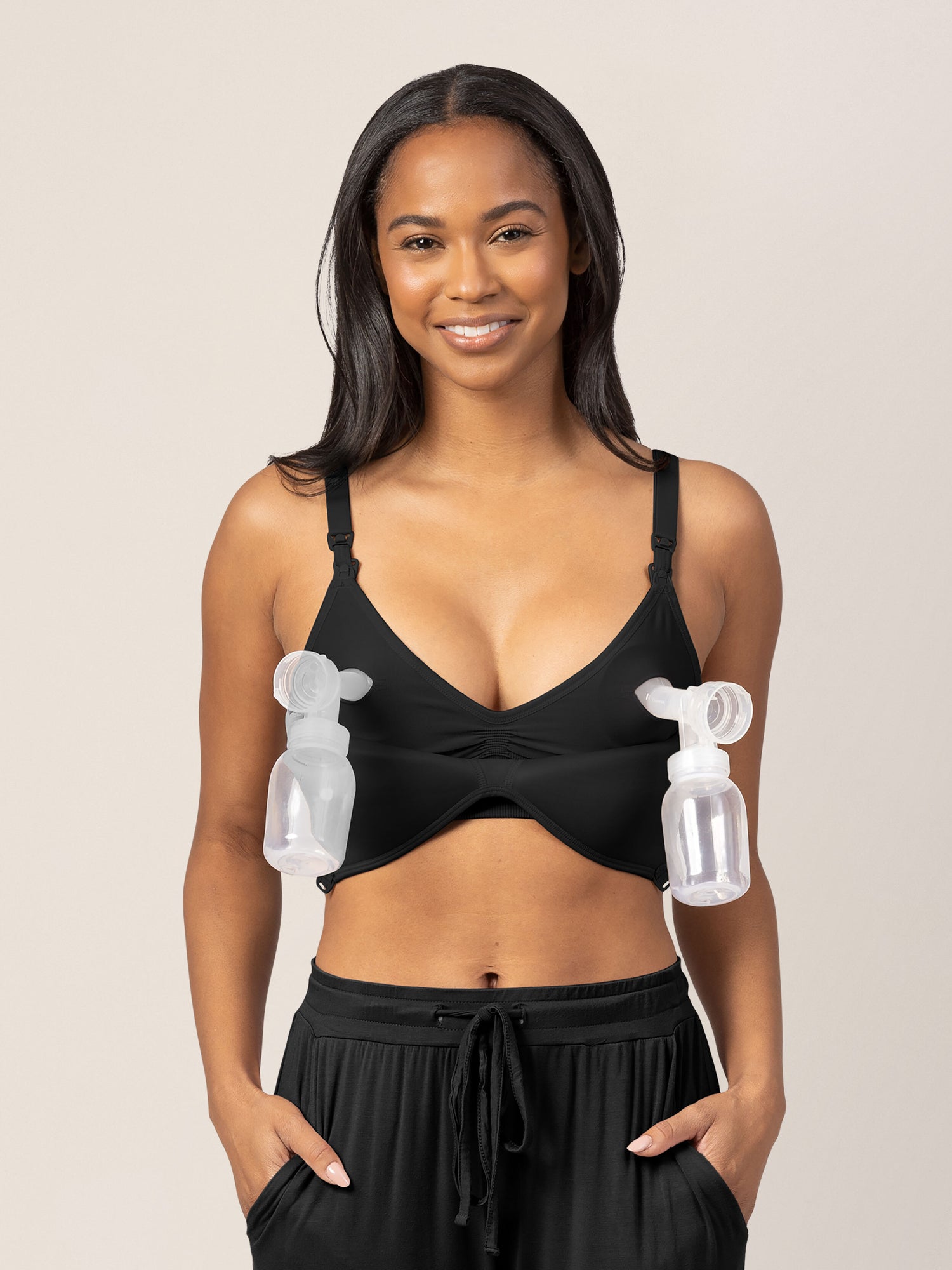 Model hooked up to two breast pumps while wearing the Signature Sublime® Contour Maternity & Nursing Bra in Black