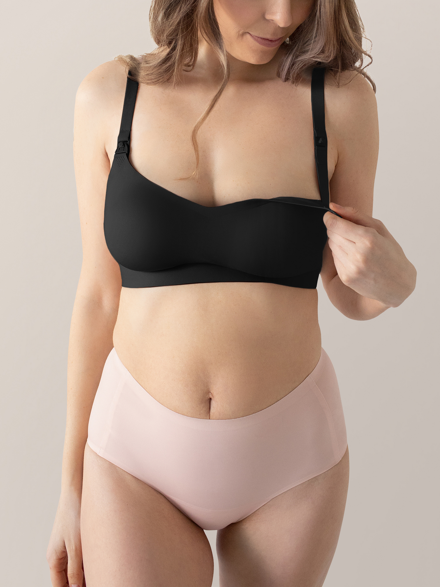 Model wearing the Ultra Comfort Smooth Classic Nursing Bra | Black showing the clip down nursing access.