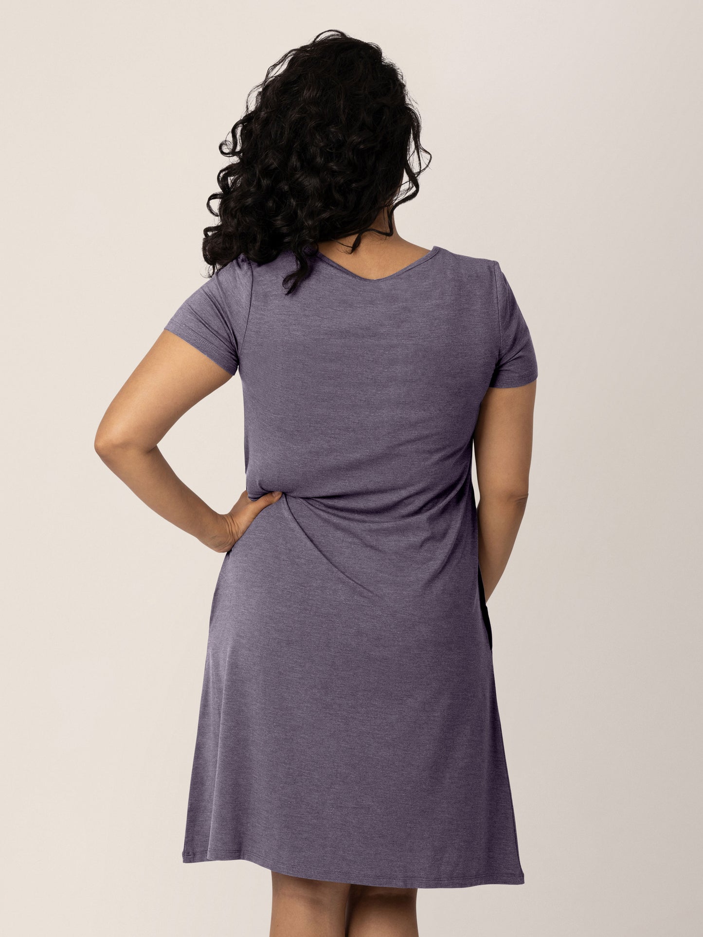 Back view of a model wearing the Eleanora Bamboo Maternity & Nursing Dress in Heathered Granite