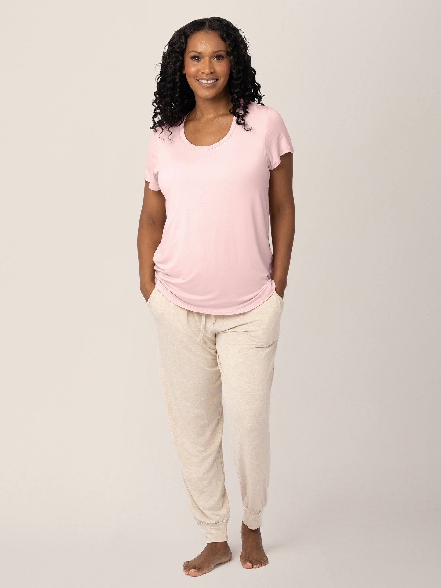 Full body view of a model wearing the  Everyday Maternity & Nursing T-shirt in Dusty Pink