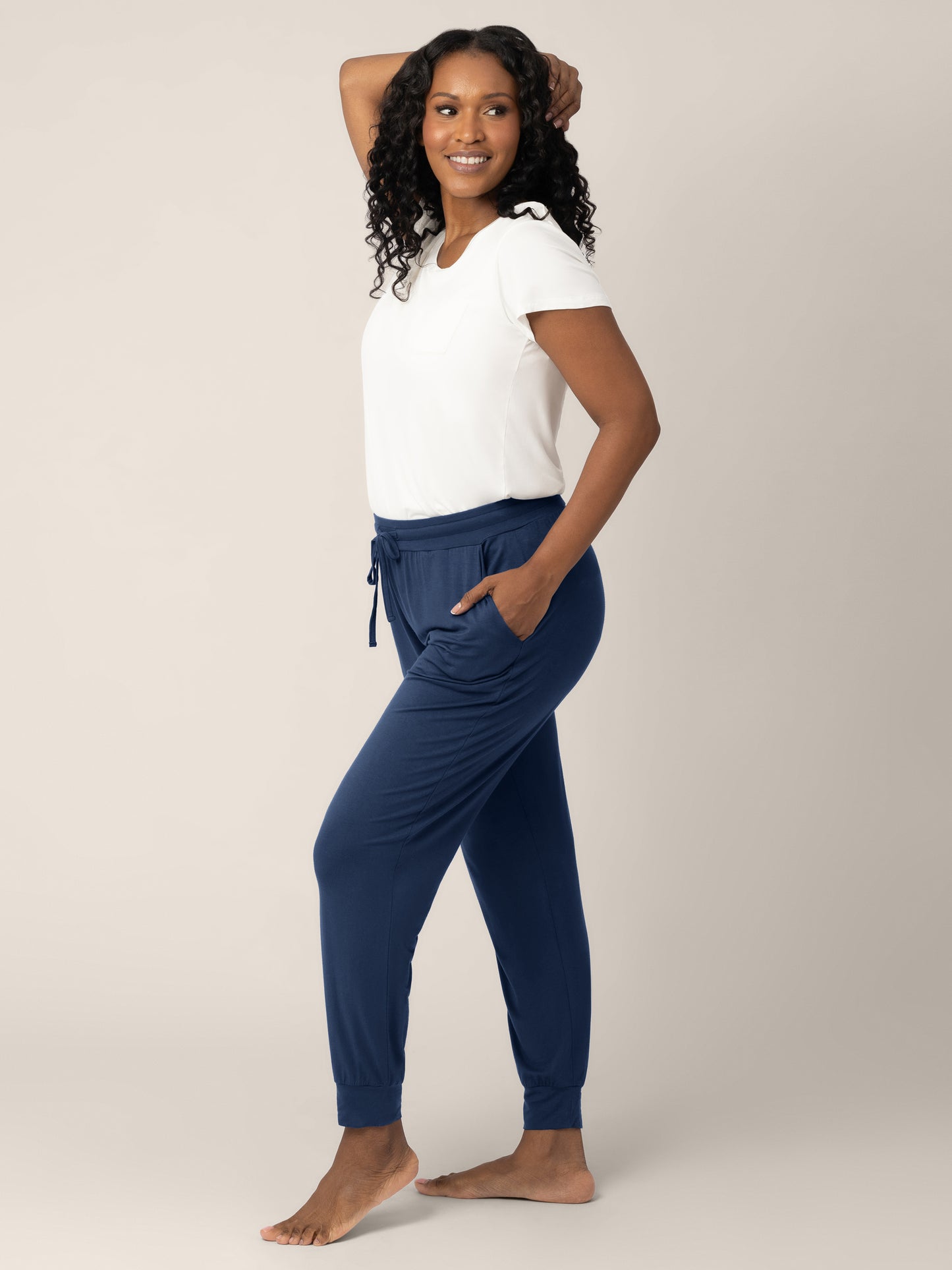 Full body view of a model wearing the Everyday Lounge Jogger in Navy