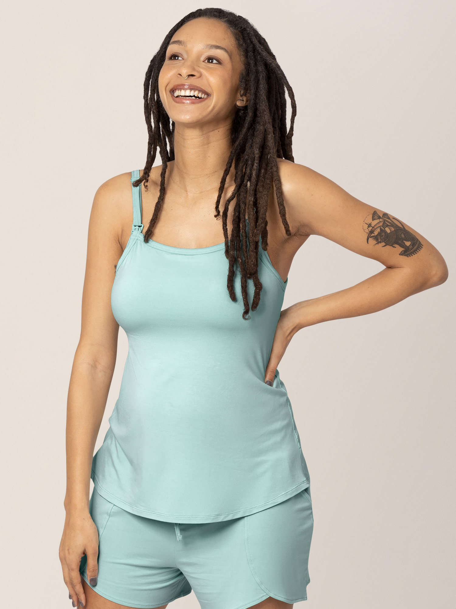 Front view of model wearing the Bamboo Lounge Around Nursing & Maternity Tank paired with the Bamboo Maternity & Postpartum Lounge Shorts, both in dusty blue green