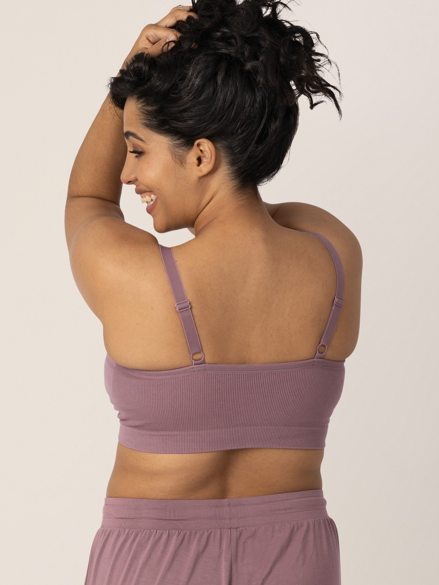 Back view of a model wearing the Sublime® Bamboo Hands-Free Pumping Lounge & Sleep Bra in Twilight 