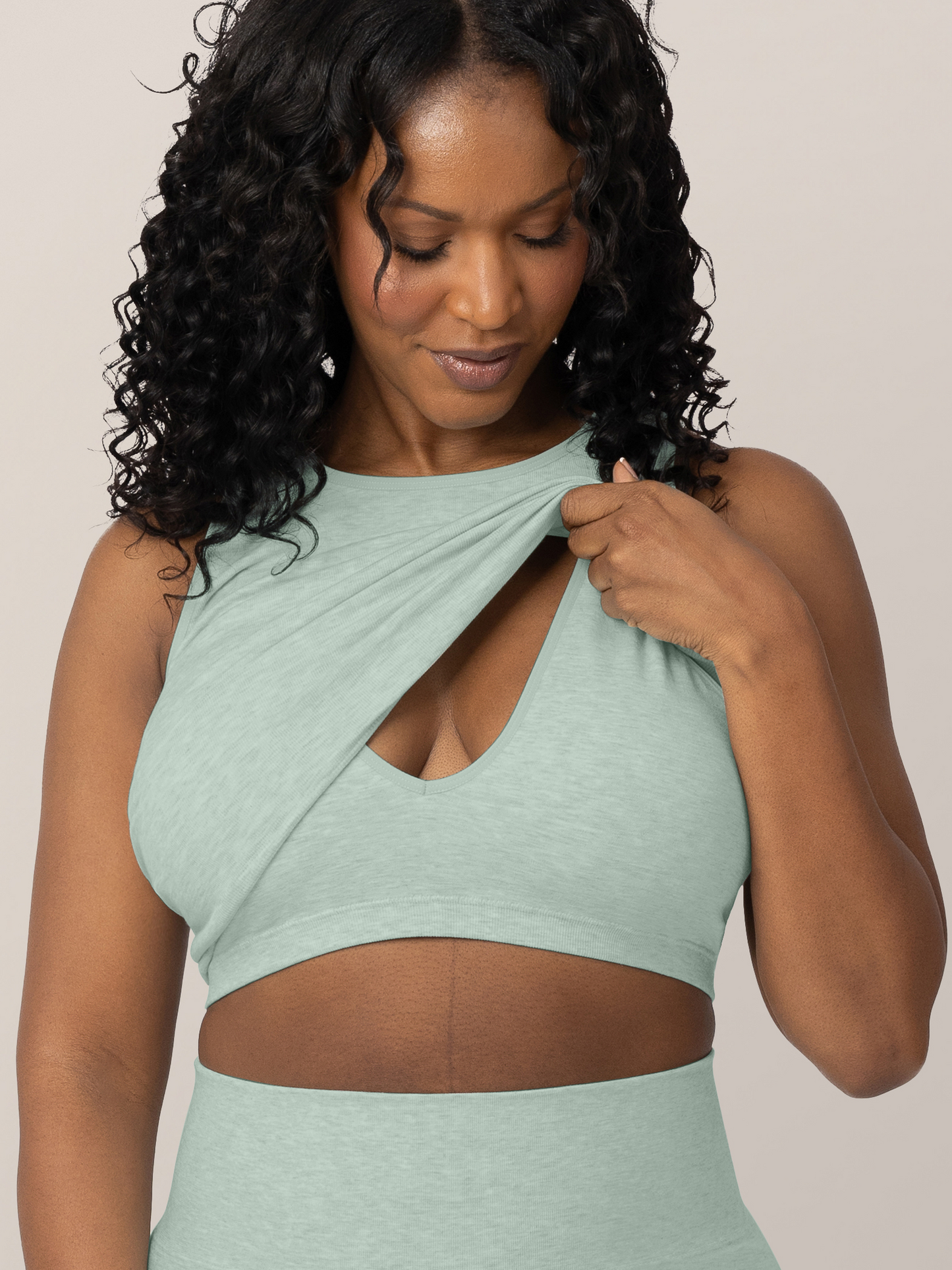 Front view of model wearing the Sublime® Bamboo Maternity & Nursing Longline Bra in dusty blue green heather, showing nursing access.