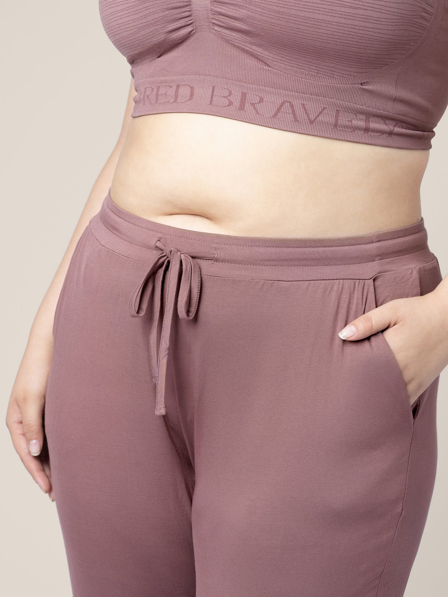 Closeup of a model wearing the Everyday Lounge Jogger in Twilight