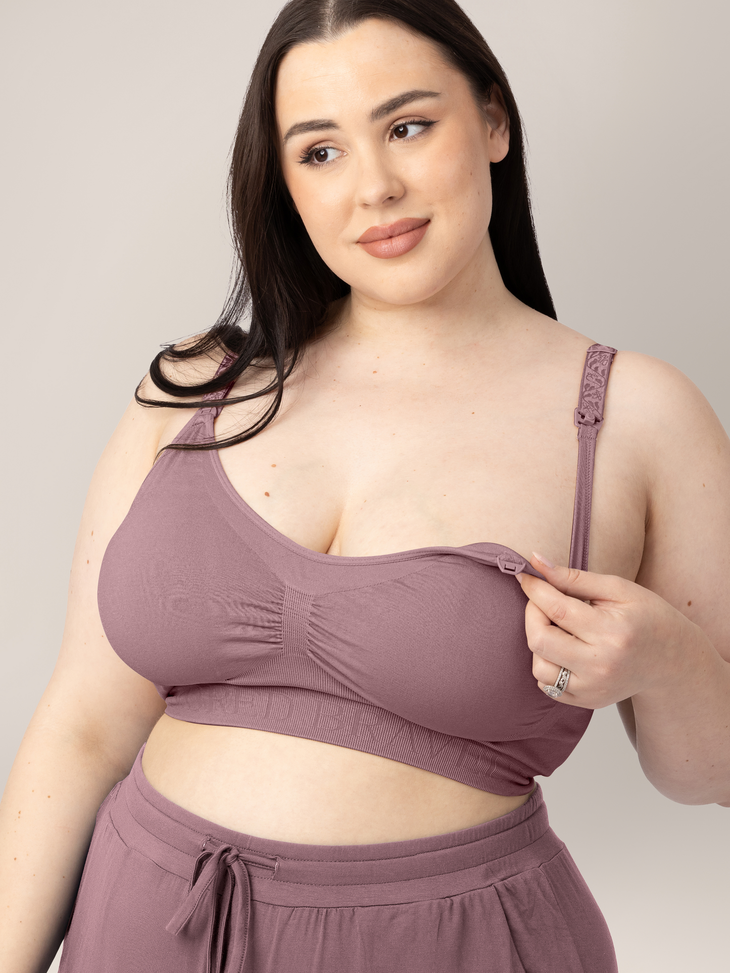 Model wearing the Simply Sublime® Nursing Bra in Twilight while showing the clip down nursing access.