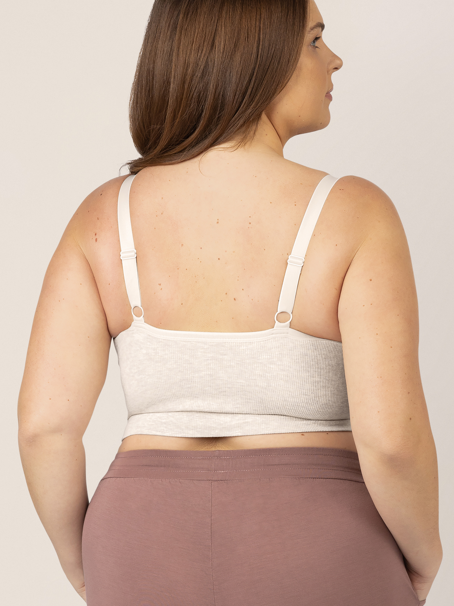 Back view of a model wearing the Sublime® Bamboo Hands-Free Pumping Lounge & Sleep Bra in Oatmeal Heather