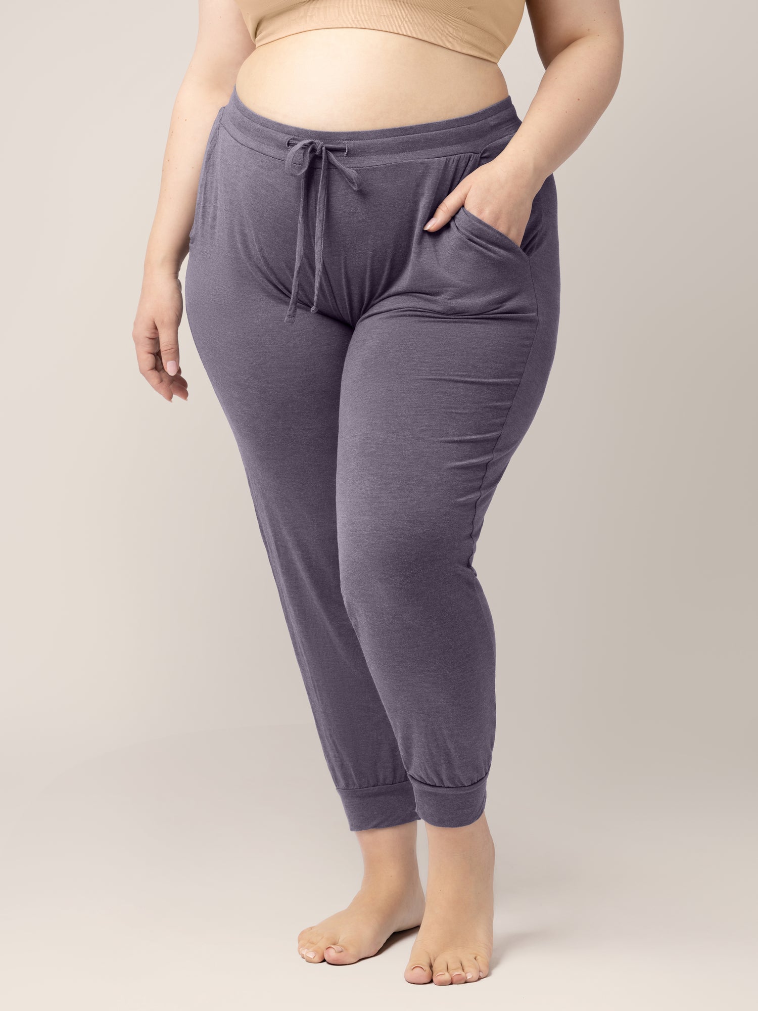 Bottom half of a model wearing the Everyday Lounge Jogger in Heathered Granite. @model_info:Rachel is 5'6" and wearing an X-Large Regular.