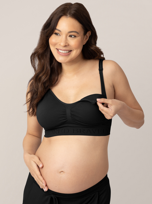 Pregnant model showing the easy clip down nursing access on the Simply Sublime® Nursing Bra in Black @model_info:Vanessa is wearing a Small.