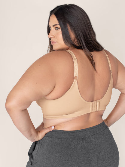Back view of a model wearing the Nellie Sublime® Wireless Bra in Beige