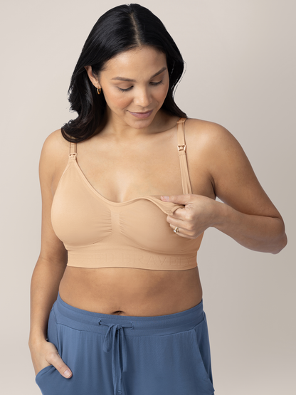 Model showing the easy clip down nursing access on the Simply Sublime® Nursing Bra in Beige