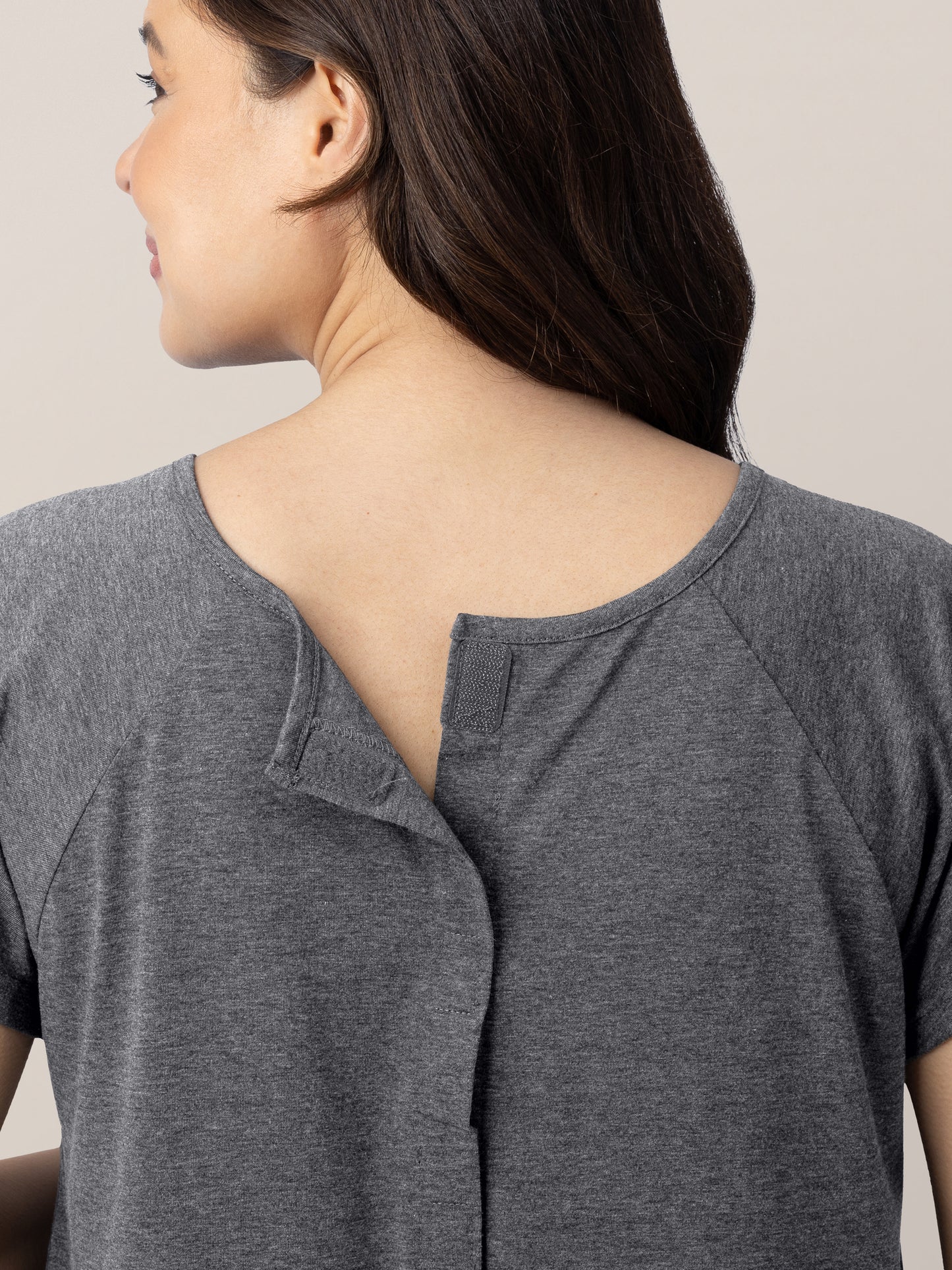 Model showing the back of the Universal Labor & Delivery Gown in Grey Heather