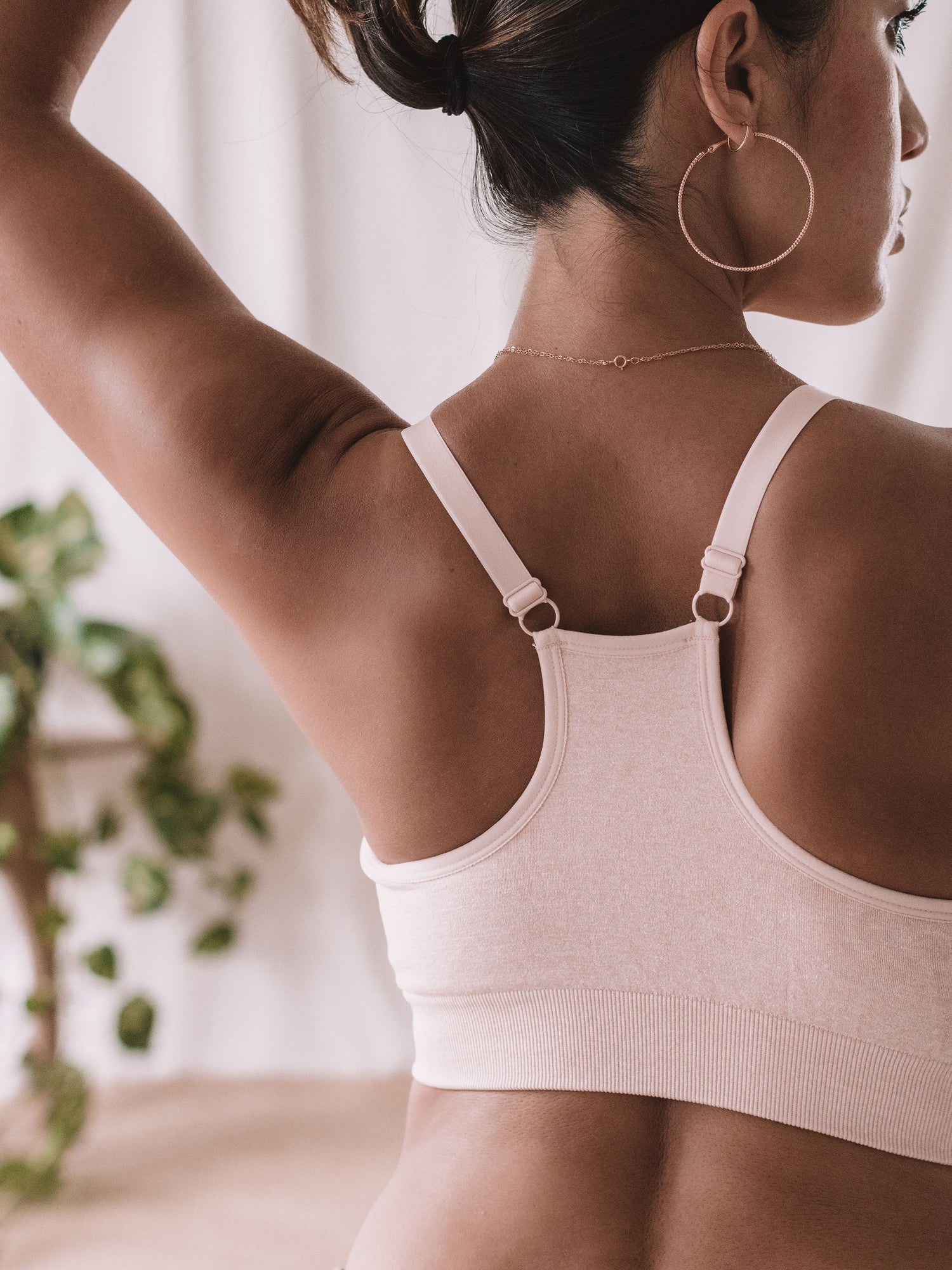 Back of a model wearing the Diana Sublime® Sports Bra in Pink Heather
