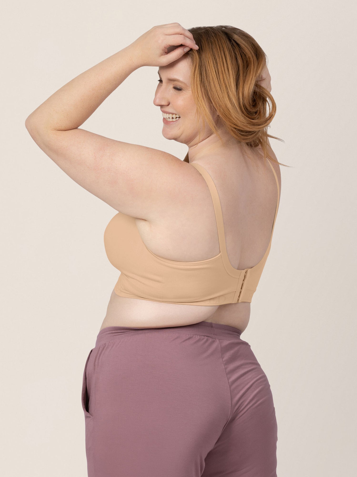 Back view of a model wearing the Signature Sublime® Contour Hands-Free Pumping & Nursing Bra in Beige